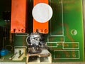 Burnt microchip, broken equipment, green microcircuit, integrated circuit, Royalty Free Stock Photo