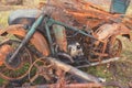 Burnt motorcycle uncovers rusted parts.