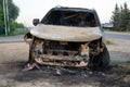 burnt-out car. A burnt-out car left abandoned at the road side of a quiet rural location Royalty Free Stock Photo