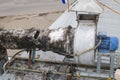 Burnt-out insulation of the ventilation duct from the barbecue and the induction motor on the roof of the building