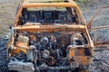 Burnt Out Rusty Car. Abandoned Wreck Royalty Free Stock Photo