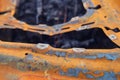 Burnt-out rusty cars on a city street, vandalism. Setting fire to cars by vandals and damage to property Royalty Free Stock Photo