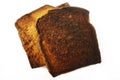 Burnt toast on white background Royalty Free Stock Photo