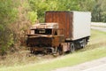 Burnt truck on the side of the road