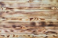 Burnt wood - tabletop with narrow pine boards Royalty Free Stock Photo