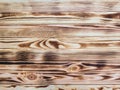 Burnt wood - tabletop with pine boards - background