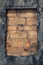 Burnt wooden frame on old brick wall Royalty Free Stock Photo