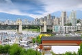 Burrard bridge, yachts and boats by Granville island. Royalty Free Stock Photo