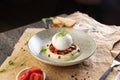 Burrata cheese with fresh tomatoes Royalty Free Stock Photo