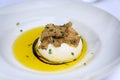 Burrata with shaved black truffle appetizer at a luxury restaurant, Nice, France Royalty Free Stock Photo