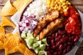 Burrito bowl with grilled chicken and vegetables close-up. Horizontal top view Royalty Free Stock Photo