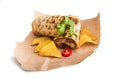 Burrito with chips on parchment Royalty Free Stock Photo