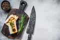 Burrito with grilled chicken and vegetables, fajitas, shawarma. White Wooden background. Top view. Copy space