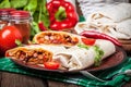 Burritos filled wiht minced meat, bean and vegetables. Royalty Free Stock Photo