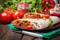 Burritos filled wiht minced meat, bean and vegetables. Royalty Free Stock Photo