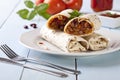 Burritos wraps with meat beans and vegetables Royalty Free Stock Photo