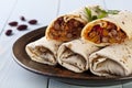 Burritos wraps with meat beans and vegetables Royalty Free Stock Photo