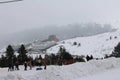 Turkey, Uludag,Riding on ski with mountains. Royalty Free Stock Photo