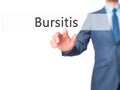 Bursitis - Businessman hand pressing button on touch screen interface.