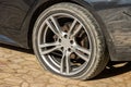 Burst flat car tire wheel. On a car Royalty Free Stock Photo