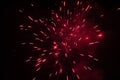 Burst of red fireworks at night - vibrant red streaks and sparks - smoke clouds - celebration, new years day, fourth of july, Royalty Free Stock Photo