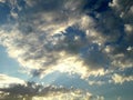Burst of sunshine rays on clouds