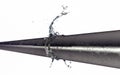Bursted copper pipe with water leaking out Royalty Free Stock Photo
