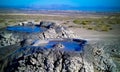 Bursting the bubble mud volcanoes, qobustan in Azerbaijan Royalty Free Stock Photo