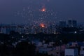 Bursting fireworks during the Divali festival of light over the city of Chennai in South India