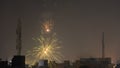 Bursting fireworks during the Divali festival of light over the city of Chennai in South India