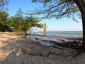 Burundi Bujumbura lake Tanganyika, windy cloudy sky and sand beach Royalty Free Stock Photo