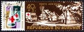 BURUNDI - CIRCA 1969: A stamp printed in Burundi shows Red Cross truck in African village, circa 1969. Royalty Free Stock Photo