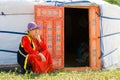 Buryat Mongolian woman by yurt