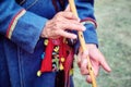 Buryat nomad playing the traditional musical instrument - the flute of the limb. Musician from Buryatia - a nomadic tribe of