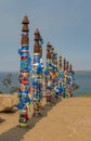 Buryat traditional pillars with colored ribbons