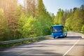 Bus on asphalt road in beautiful spring day Royalty Free Stock Photo