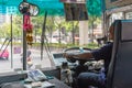 Bus driver drives bus in Bangkok