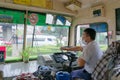 Bus driver drives bus in Bangkok