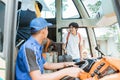 the bus driver turned to see a male passenger carrying a suitcase Royalty Free Stock Photo