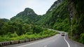 A bus driving on moutain road in Haiphong