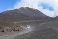 Bus getting tourists on the summit of Etna volcano 