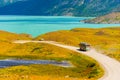 The bus goes on the road, Torres del Paine National Park, Patagonia, Chile, South America. Copy space for text Royalty Free Stock Photo