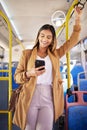 Bus, happy woman and phone with public transport, social media scroll and smile with business commute. City travel, stop Royalty Free Stock Photo