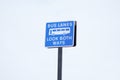 Bus lanes look both ways blue sign post bus icon in sky large space at airport