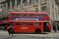 Bus London Tour in a vintage double-decker red bus