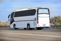 Bus moves along suburban highway Royalty Free Stock Photo