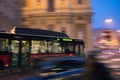 Bus moving fast in the night city motion blur