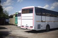 Bus parking. The buses are in a row.