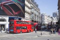 Bus passing large screen in piccadilly circus