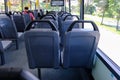 Bus seats on empty double decker bus. Blank advertising space; for mockup display; bus seat sticker wrap Royalty Free Stock Photo